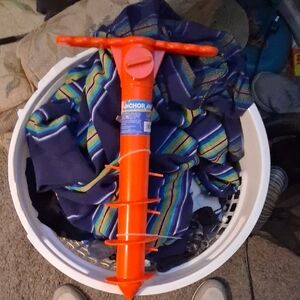 Orange outdoor umbrella Anchor Tool